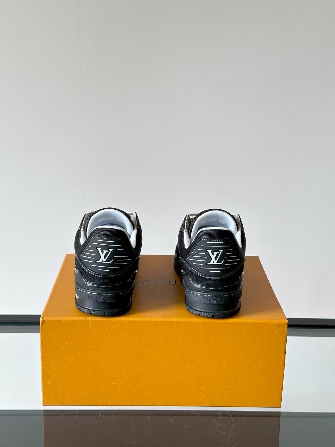 LV trainer black and gray denim