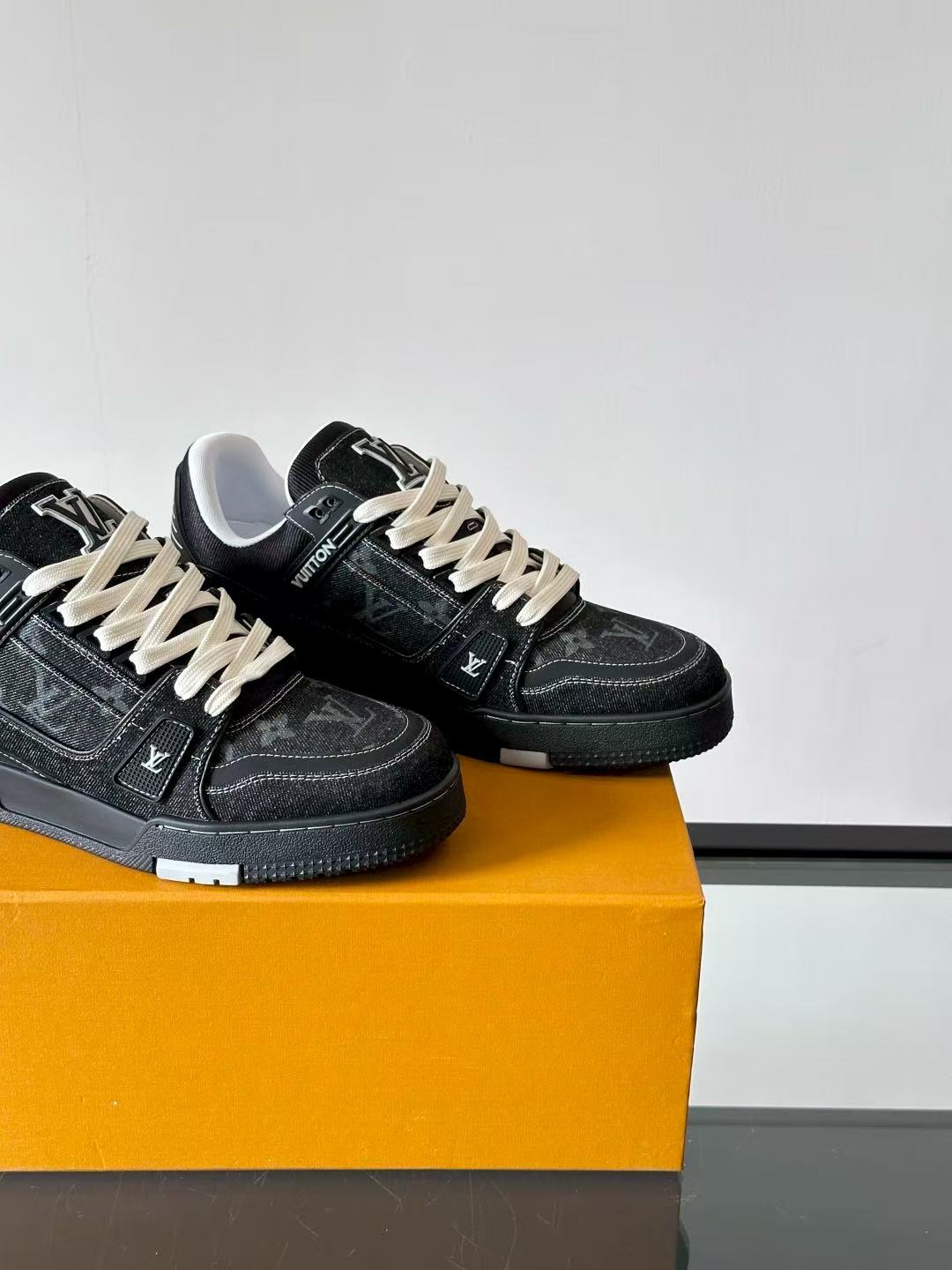 LV trainer black and gray denim