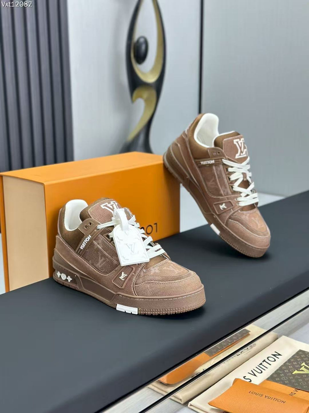 LV trainer brown denim