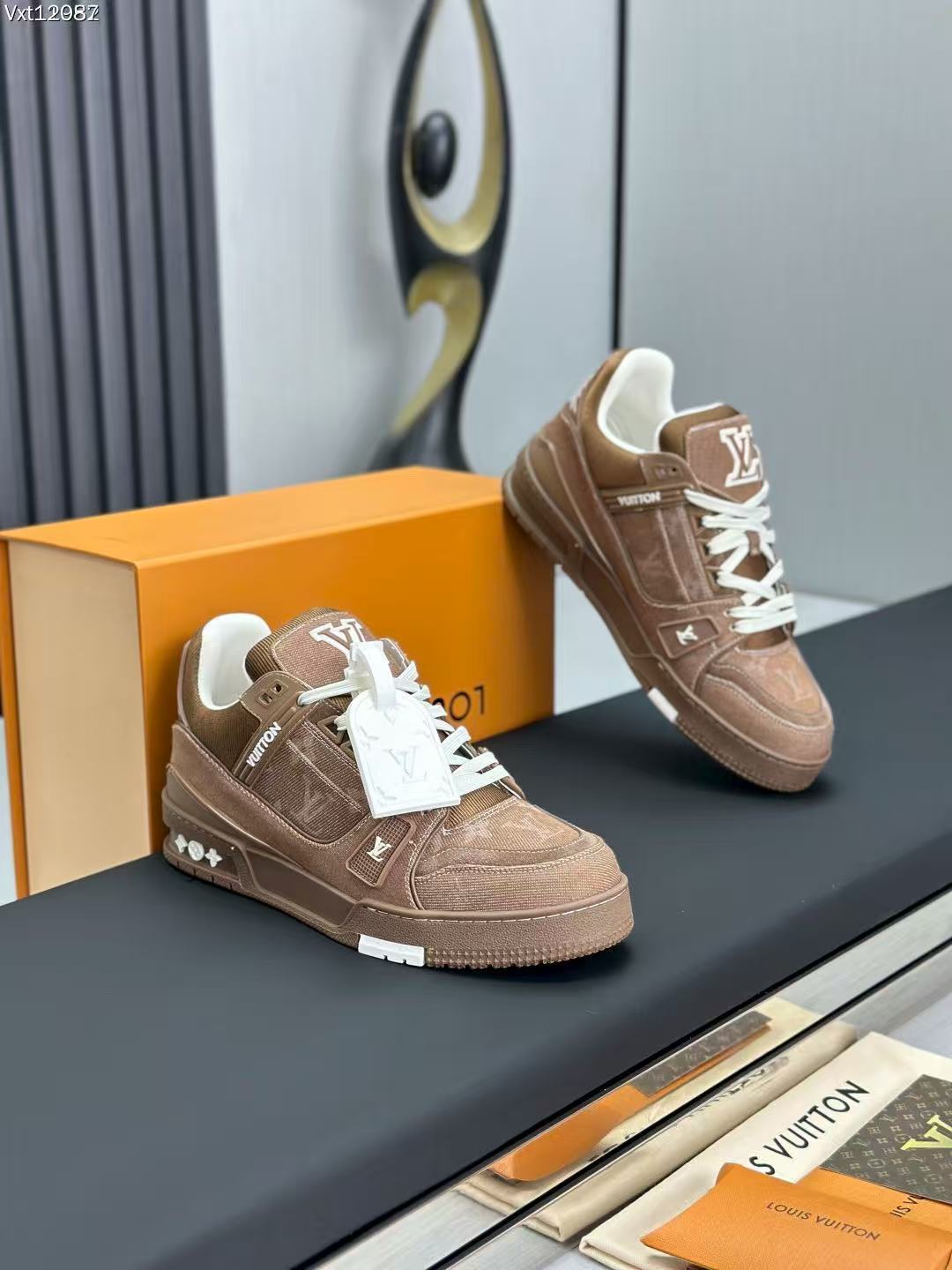 LV trainer brown denim