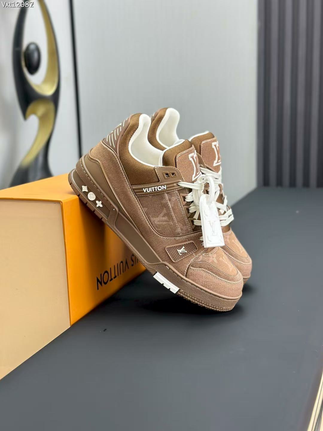 LV trainer brown denim