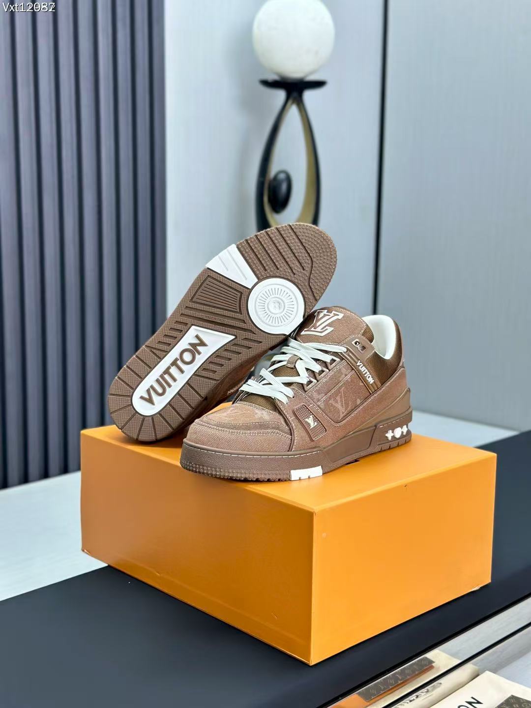 LV trainer brown denim
