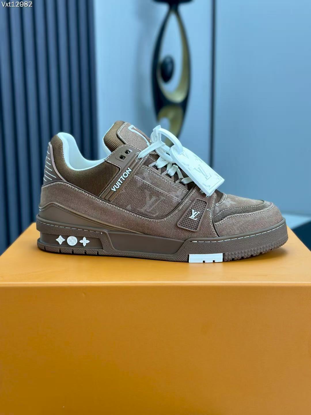 LV trainer brown denim