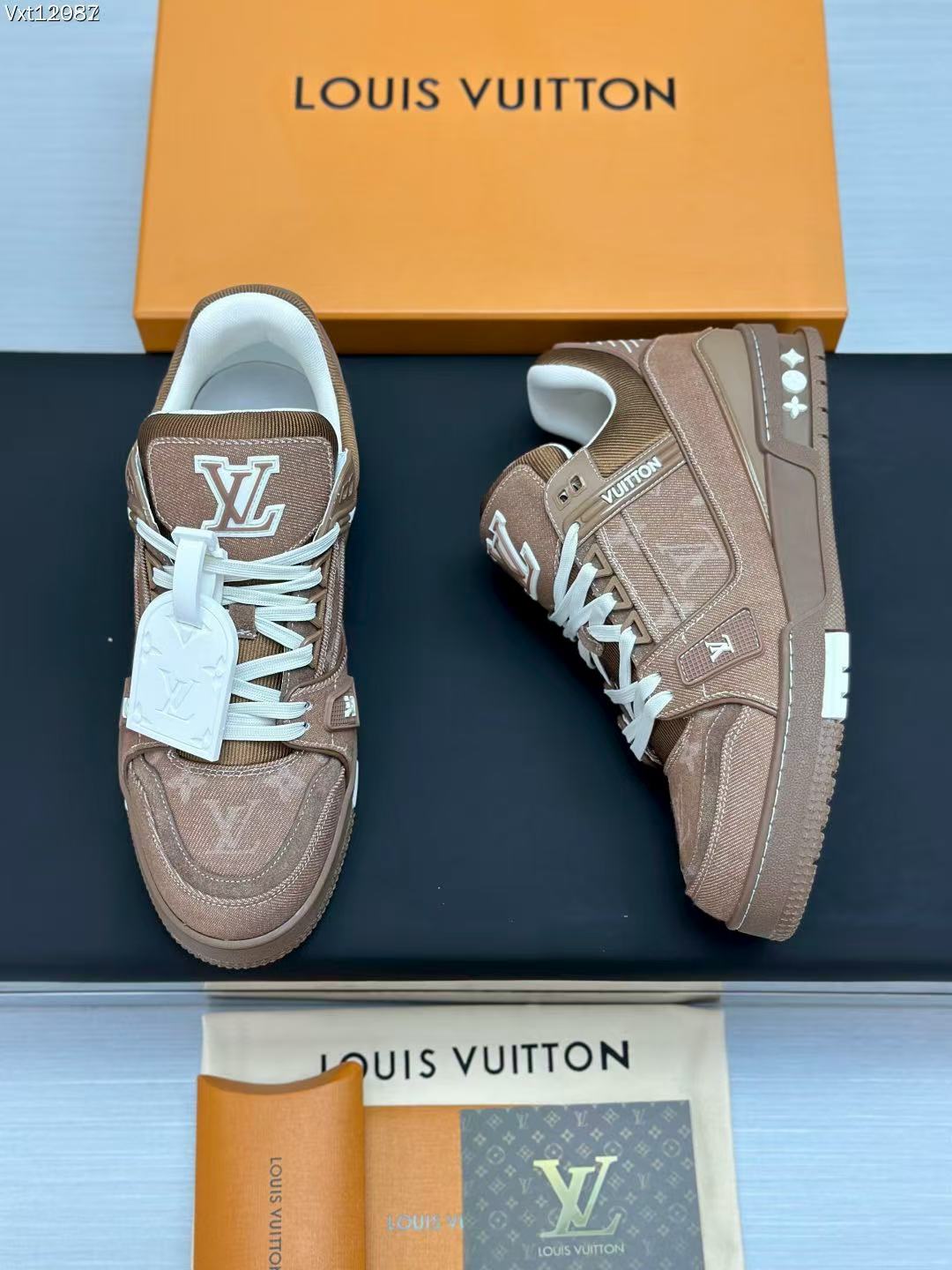 LV trainer brown denim