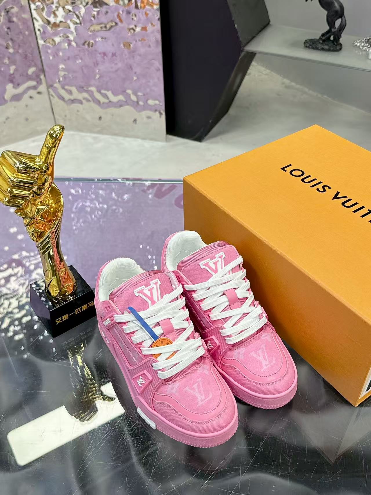 LV trainer pink denim